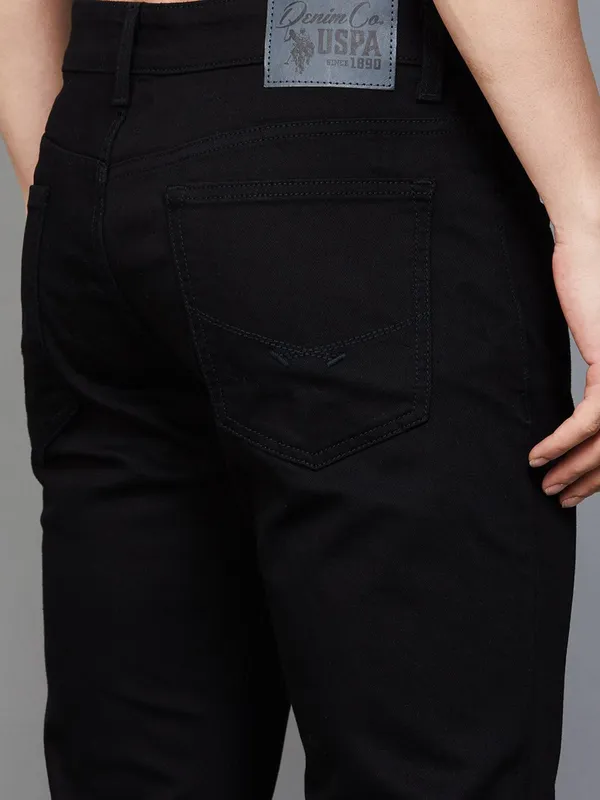 US POLO solid black slim tapered denim jeans for men