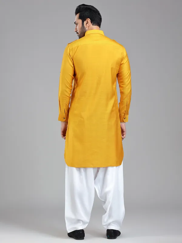 Vibrant energetic mustard yellow mens pathani kurta suit