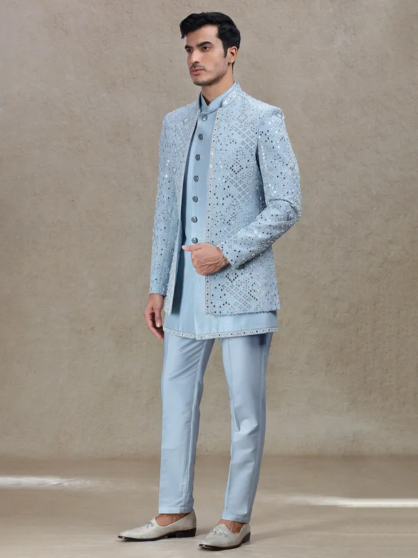 Vibrant light blue indo western for wedding and reception