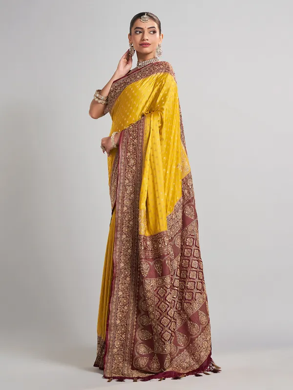 Vibrant mustard yellow satin silk saree for festive occasions