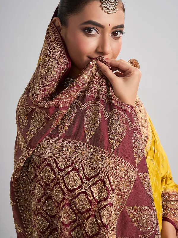 Vibrant mustard yellow satin silk saree for festive occasions