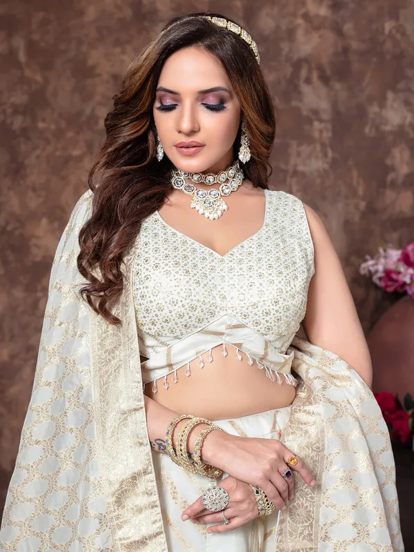 Vibrant off white silk lehenga choli