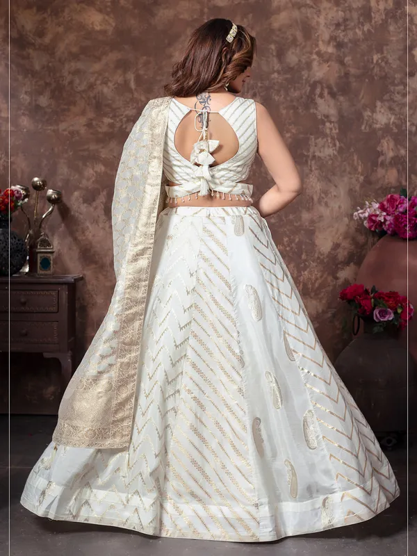 Vibrant off white silk lehenga choli