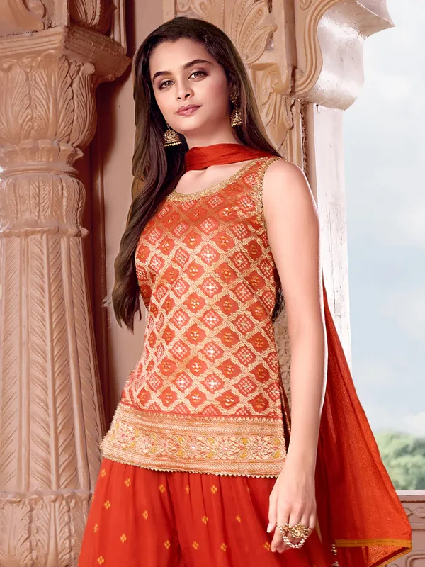 Vibrant orange silk palazzo suit for wedding wear