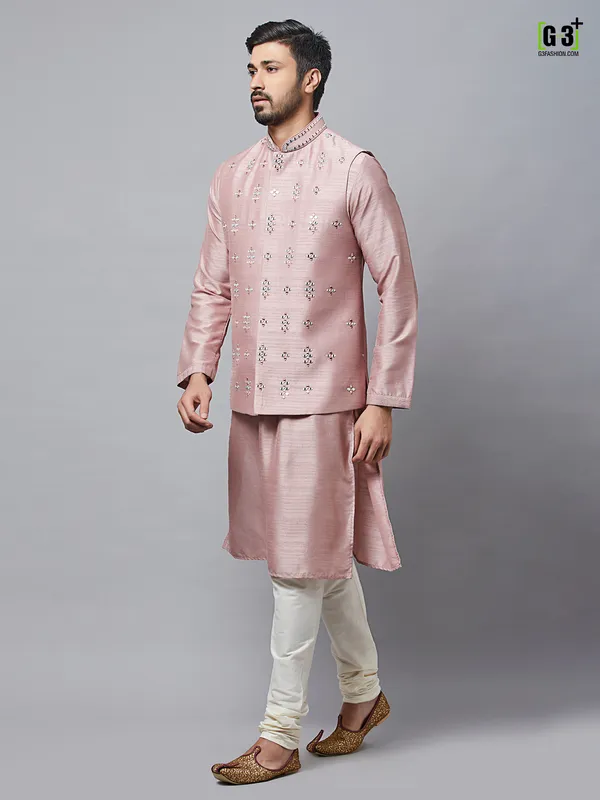 Waistcoat paired with onion pink raw silk kurta suit