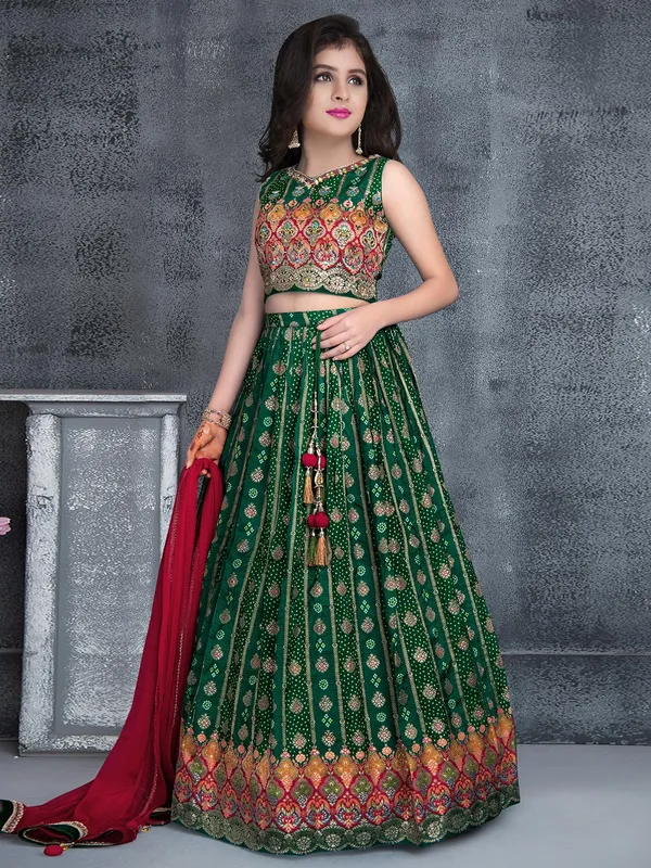Wedding look dark green lehenga choli in silk for girls