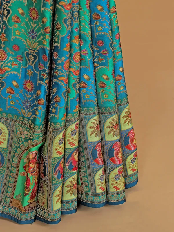 Wedding style blue silk printed saree