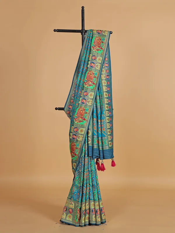 Wedding style blue silk printed saree