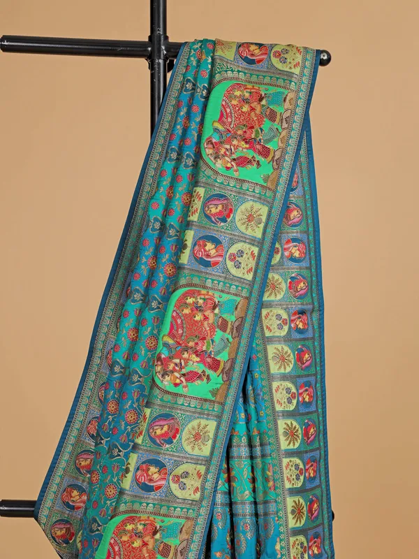 Wedding style blue silk printed saree