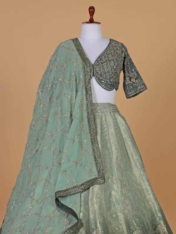 Wedding style bottle green raw silk lehenga choli with dupatta