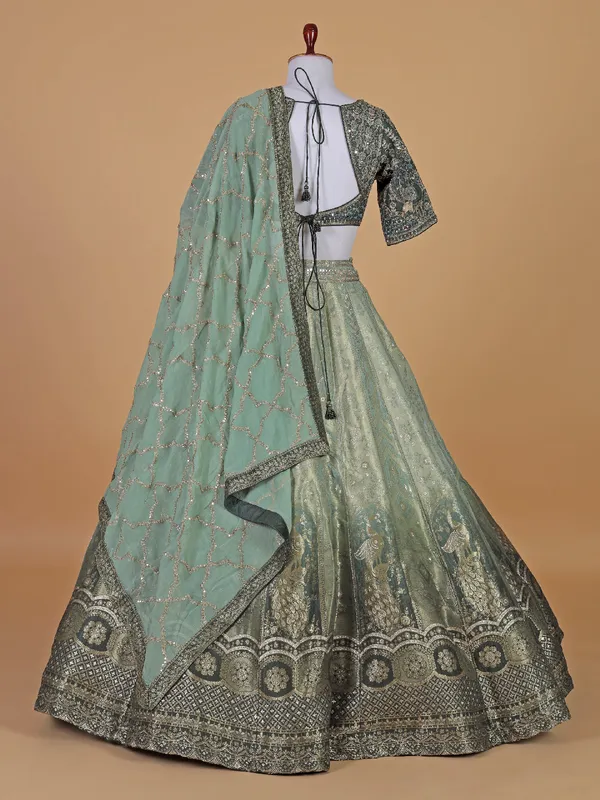 Wedding style bottle green raw silk lehenga choli with dupatta