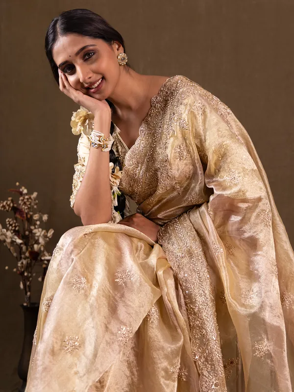 Wedding style golden tissue silk saree