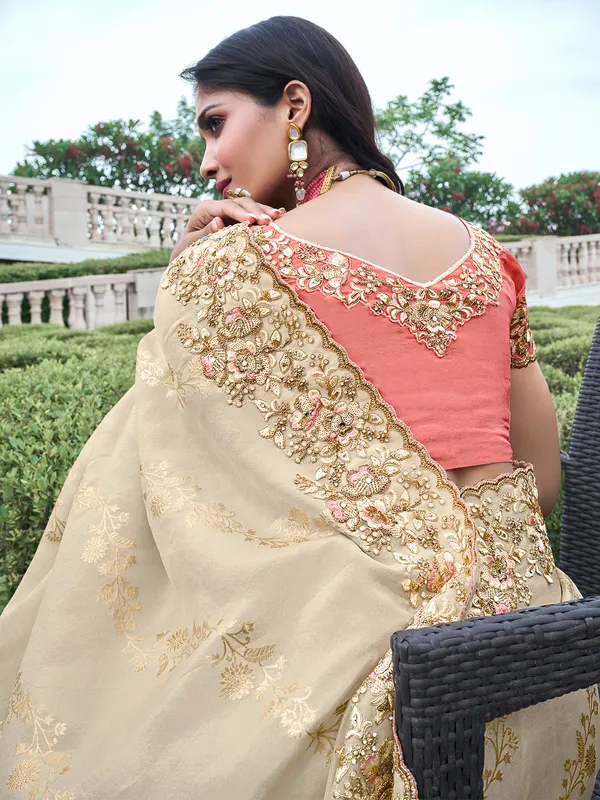 Wedding wear beige tissue silk saree