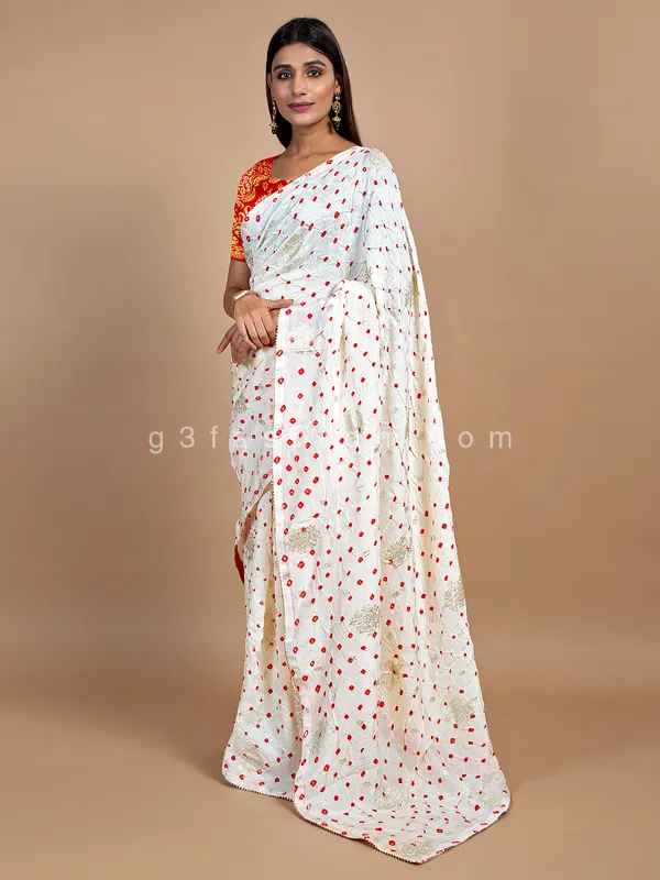 Wedding wear cream bandhej saree