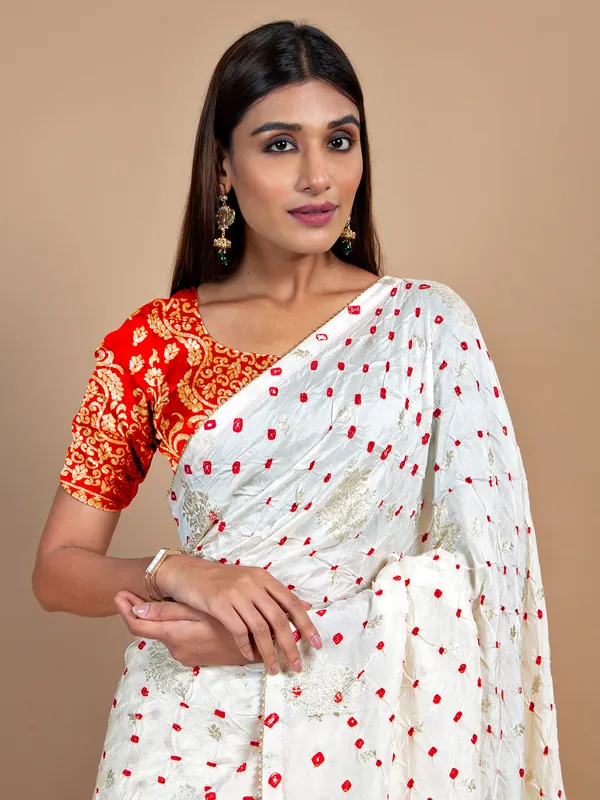 Wedding wear cream bandhej saree