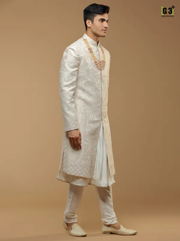 Wedding wear peach hued silk sherwani