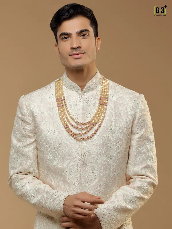 Wedding wear peach hued silk sherwani