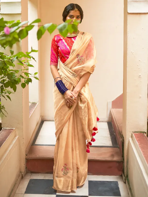 Wedding wear tissue silk cream saree
