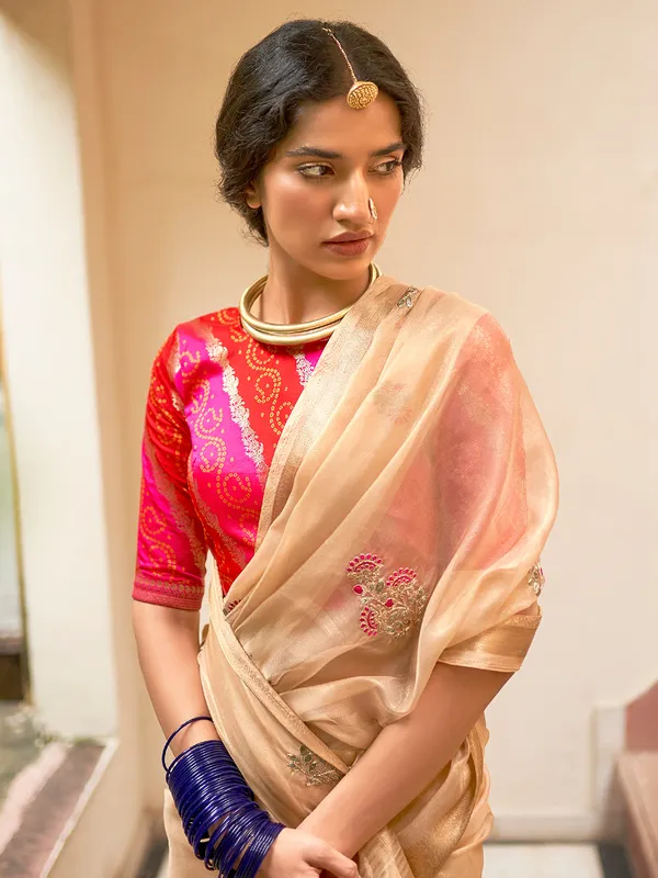 Wedding wear tissue silk cream saree