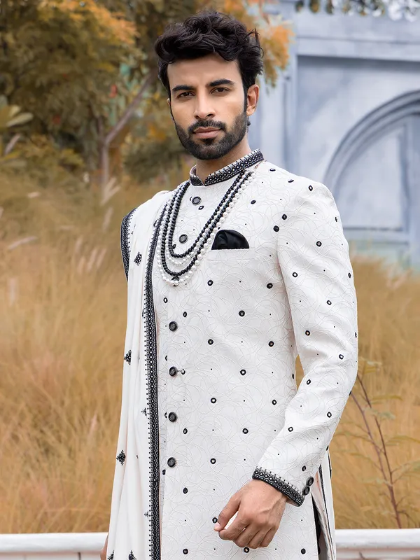 White and black raw silk sherwani for groom