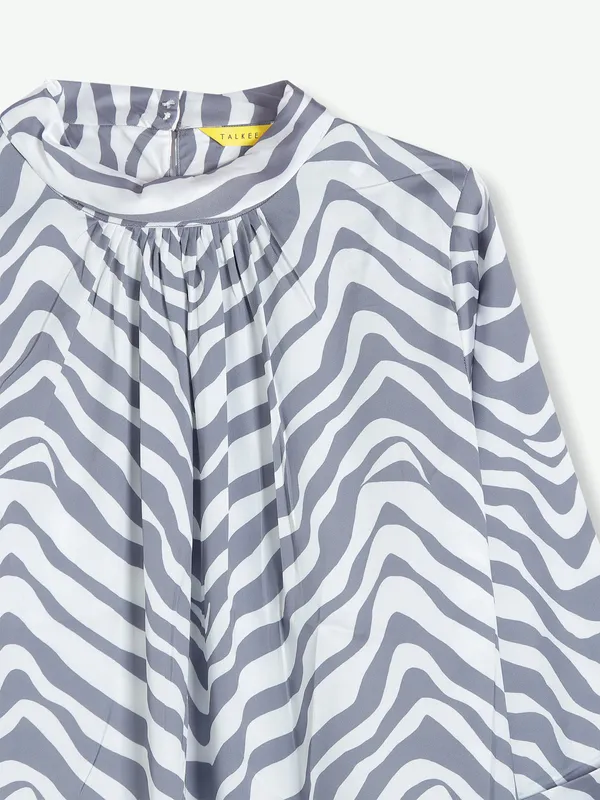 White and grey polyester printed top
