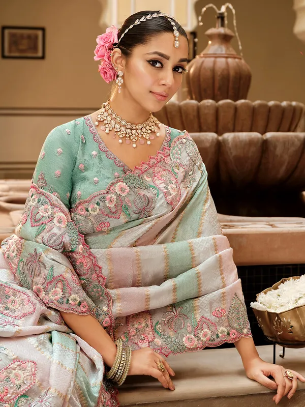 White and mint green silk saree for wedding