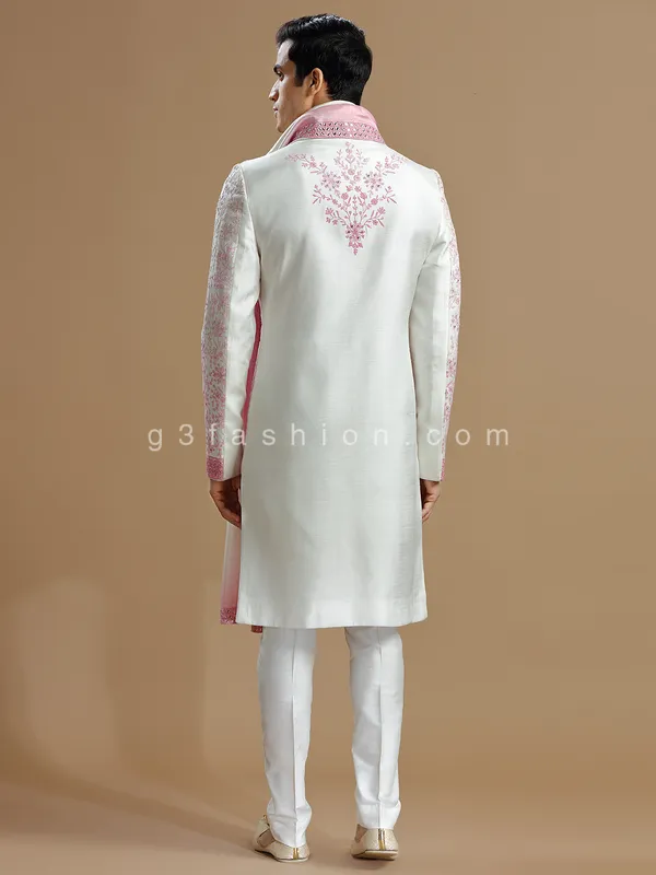 White and pink raw silk sherwani for groom