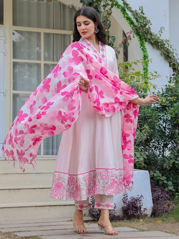 White and pink suit perfect for special celebrations