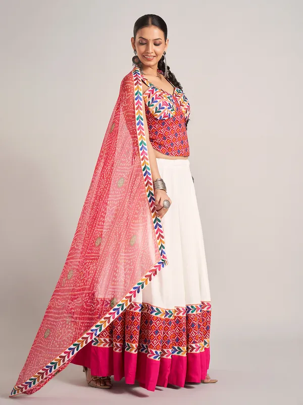 White and rani pink silk navratri chaniya choli