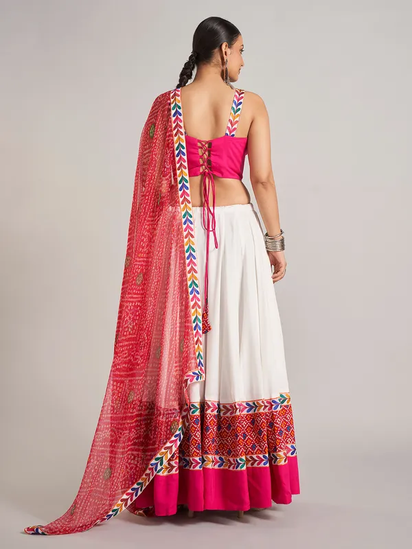 White and rani pink silk navratri chaniya choli