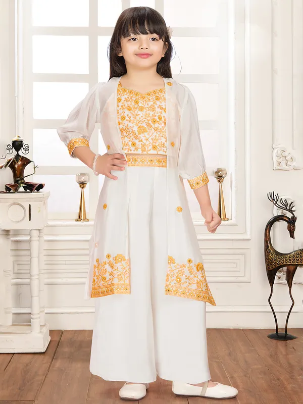 White and yellow jacket style palazzo suit