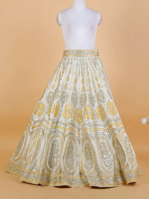 White and yellow silk lehenga choli