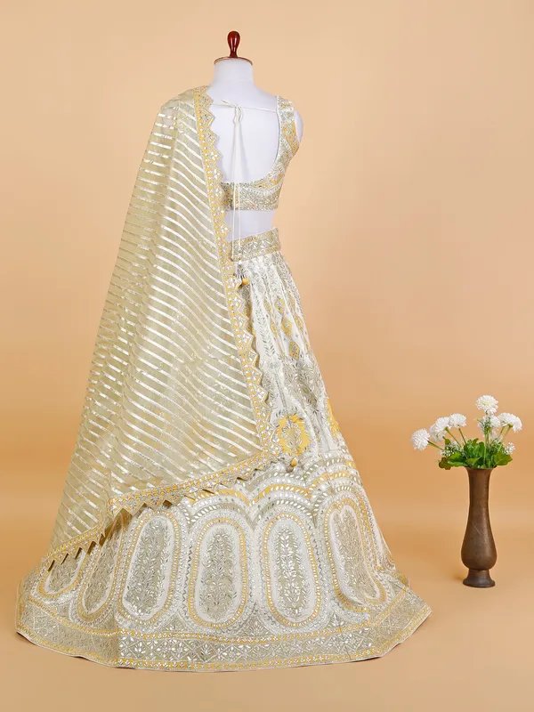 White and yellow silk lehenga choli