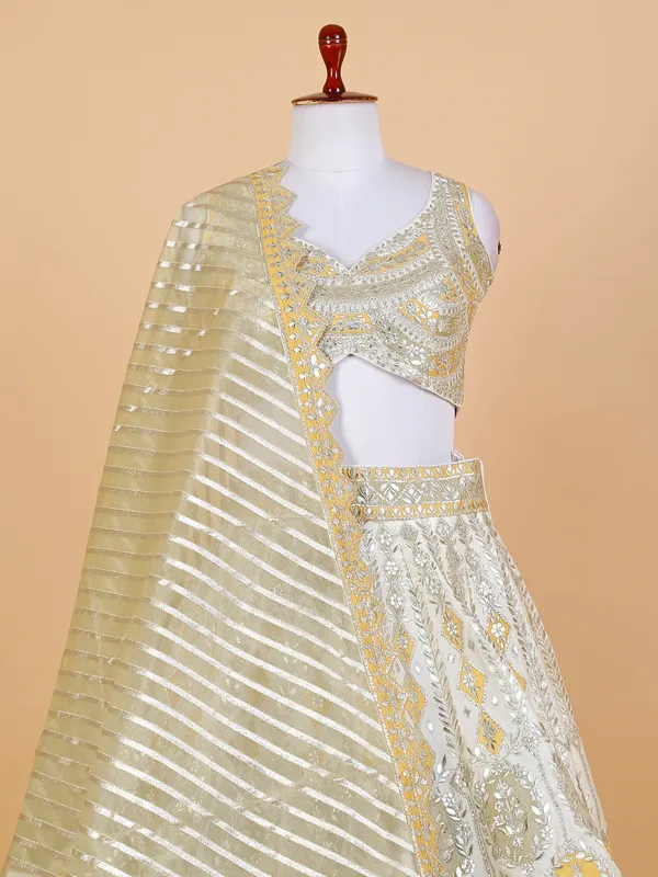 White and yellow silk lehenga choli