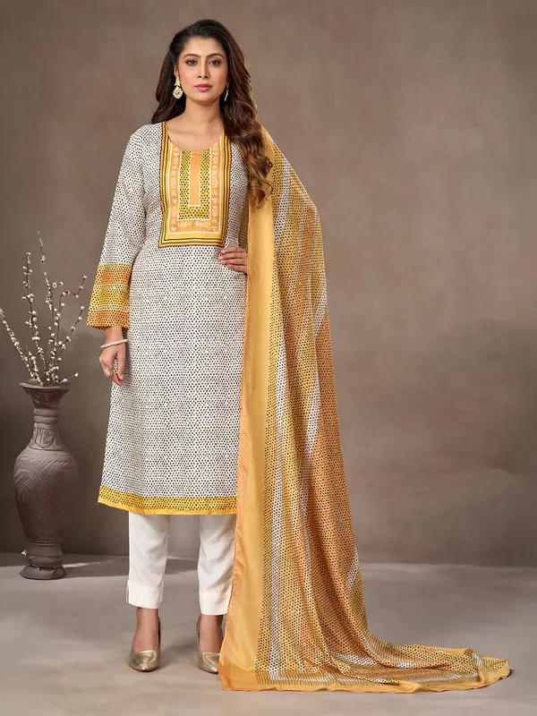 White and yellow silk pant suit
