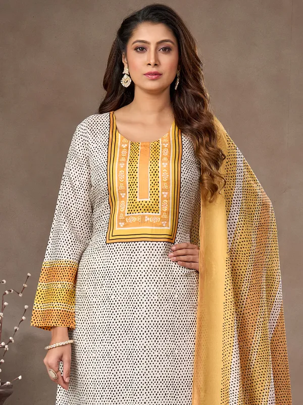 White and yellow silk pant suit