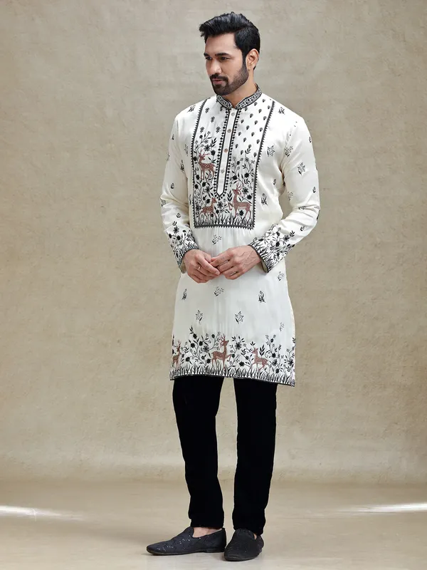 White embroideried kurta pajama set for charming look