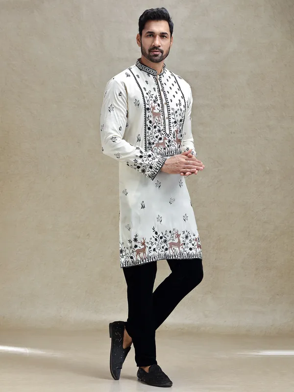 White embroideried kurta pajama set for charming look
