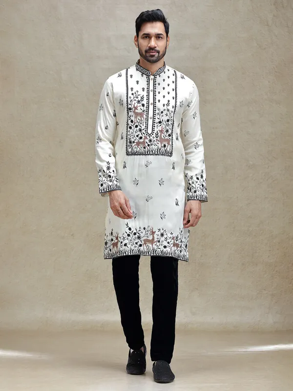 White embroideried kurta pajama set for charming look