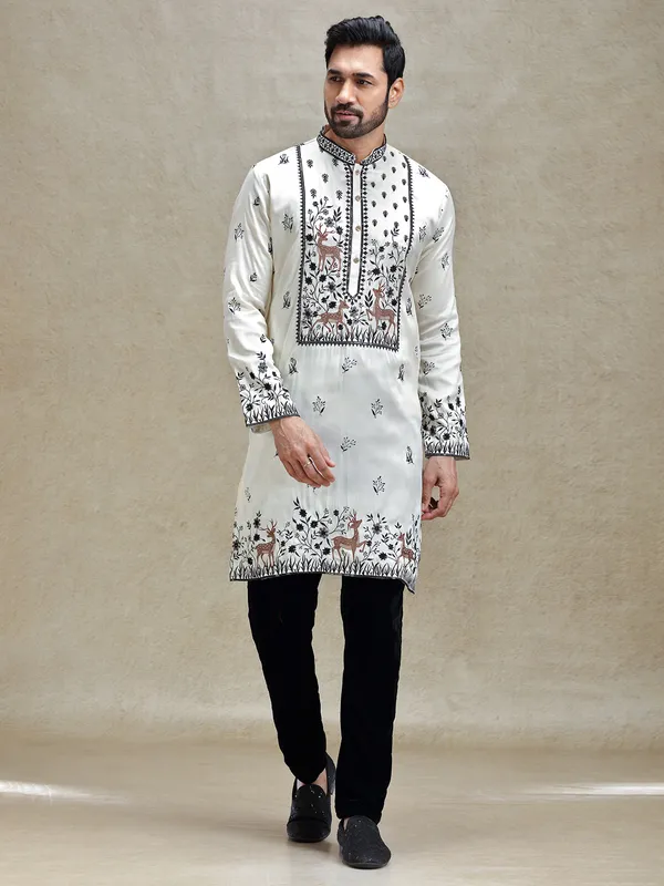 White embroideried kurta pajama set for charming look