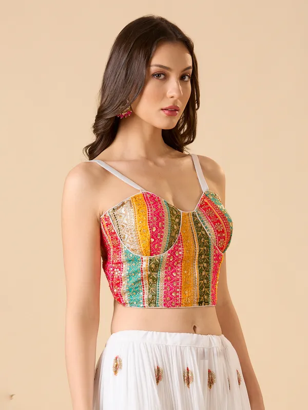 White georgette embroidered and sleeveless ready made blouse