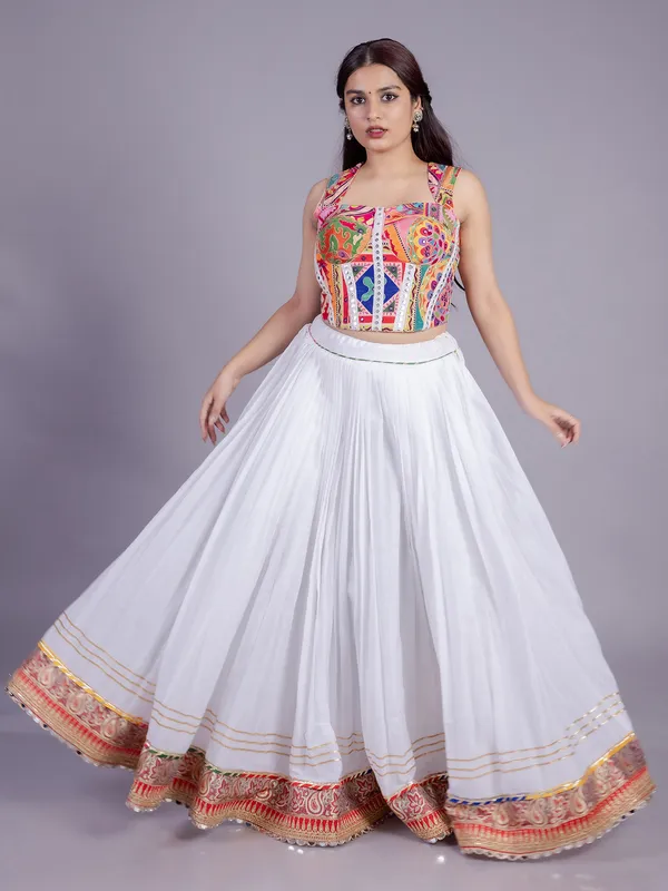 White navratri lehenga choli with embroidered blouse