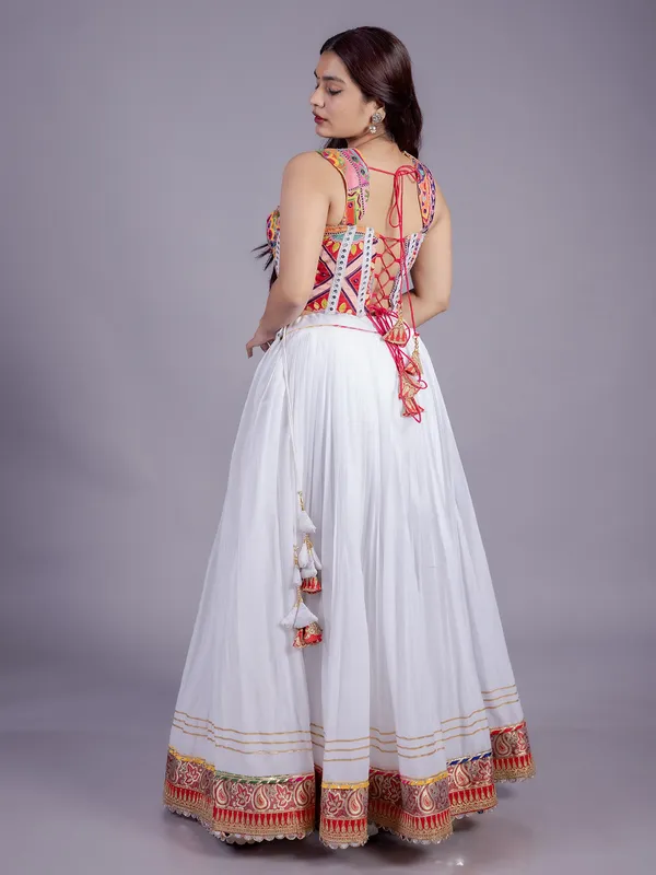 White navratri lehenga choli with embroidered blouse