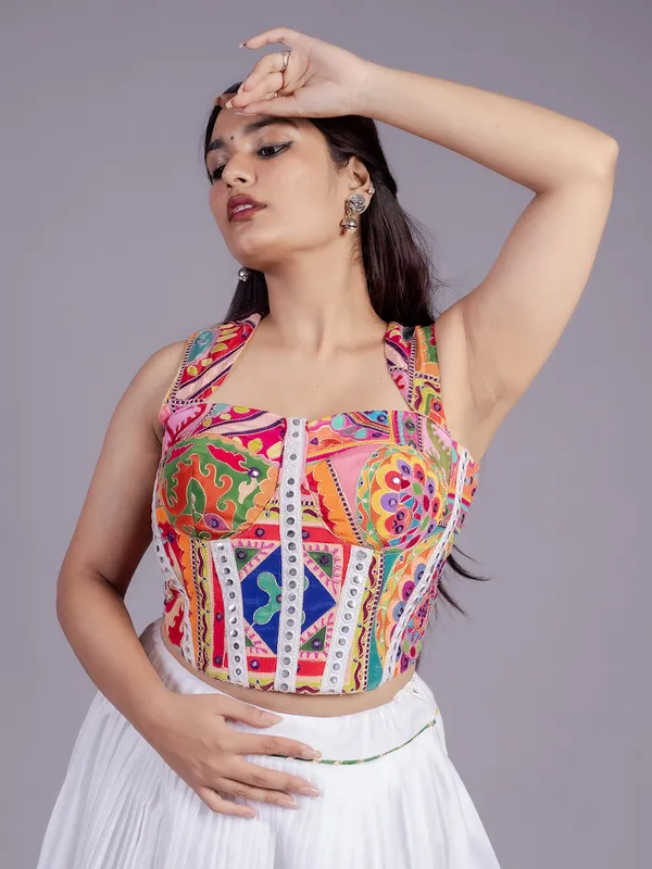White navratri lehenga choli with embroidered blouse