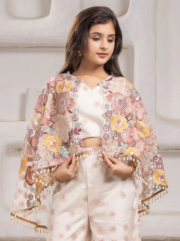 White net palazzo salwar suit with elegant jacket