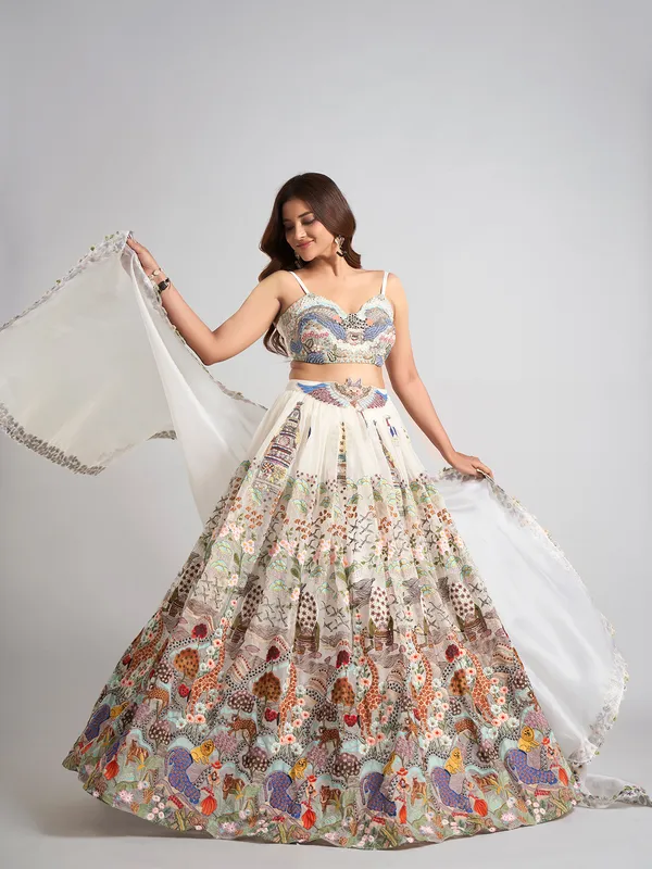 White net stone work lehenga choli with dupatta