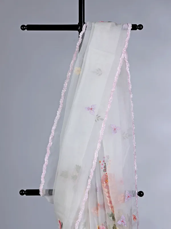 White organza saree with embroidery