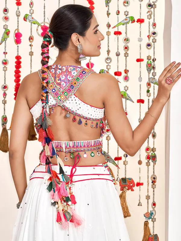 White silk lehenga choli with embellished choli