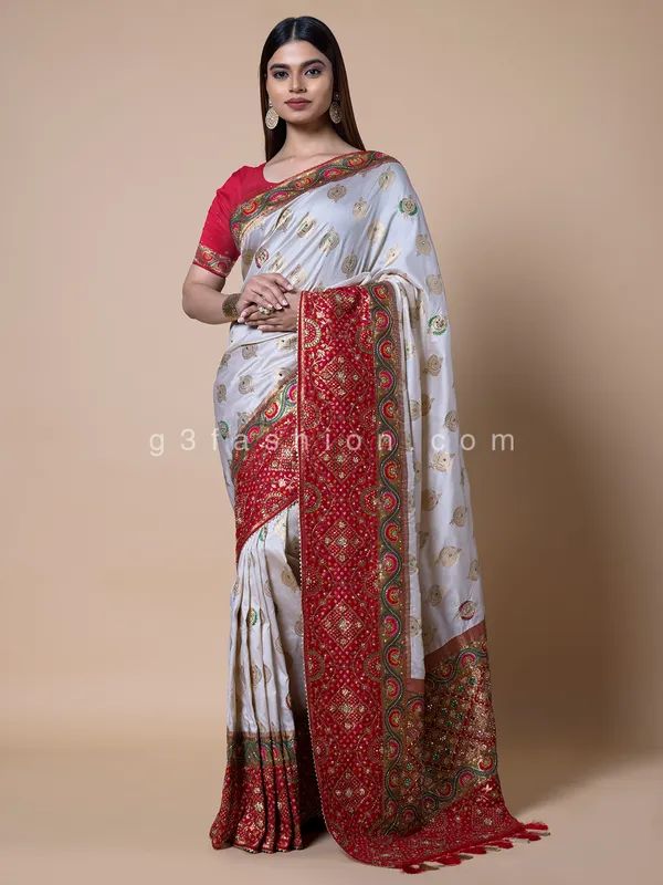 White silk saree with contrast border