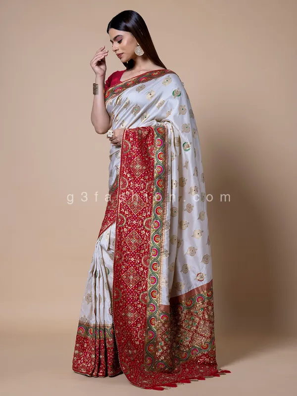 White silk saree with contrast border